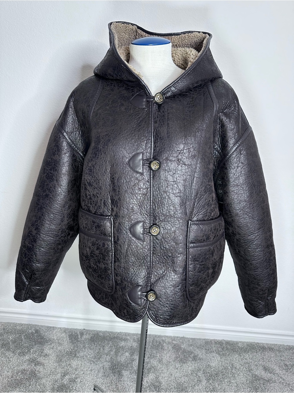 We The Free Black Hooded Faux Leather Puffer with Reversible Tan Sherpa Side